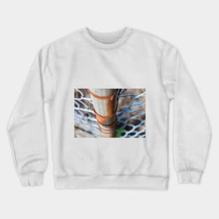 Rusty Pole  and fence close up Crewneck Sweatshirt